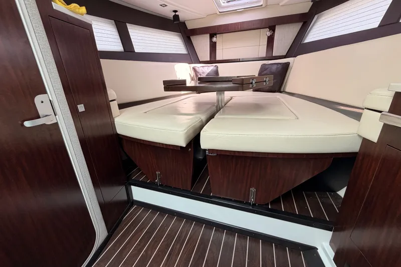 Slide: The Image of Luxurious interior of 2018 Monterey 360 Sport Coupe with elegant seating and wood accents. - 30