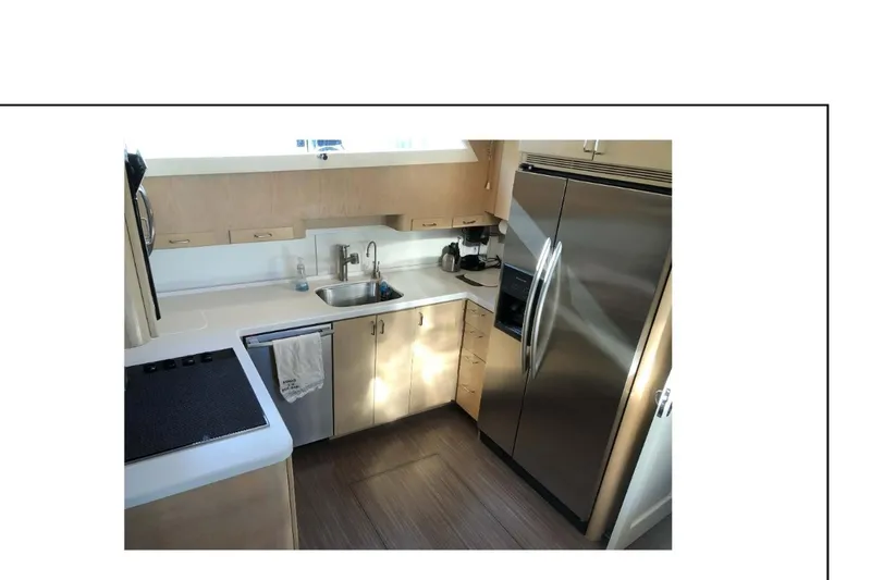 Slide: The Image of Interior of 1977 Hatteras 58 Yacht Fisherman with cozy seating and helm station. - 7