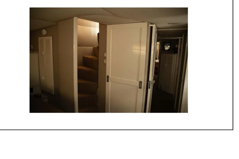 Slide: The Image of 1977 Hatteras 58 Yacht Fisherman kitchen with modern appliances and sleek design. - 8