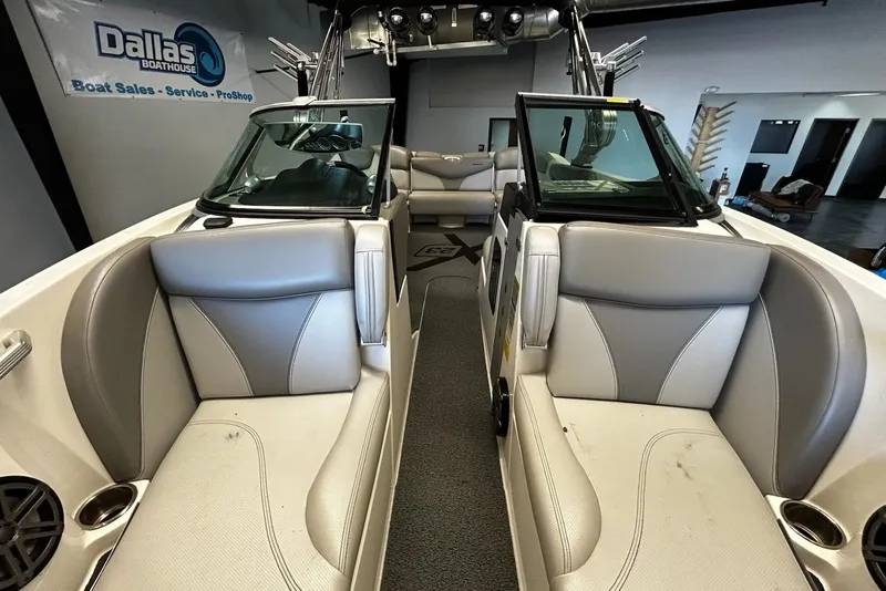 Slide: The Image of 2016 MasterCraft X23 interior with gray seating at Dallas Boathouse showroom. - 9