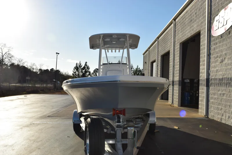 Slide: The Image of 2026 BlackJack 256 Coastal boat on trailer outside a warehouse. - 3