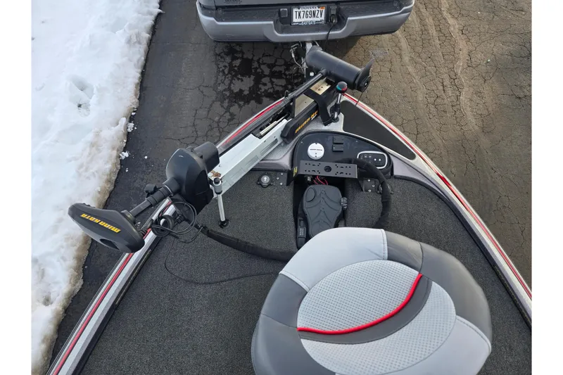 Slide: The Image of 2013 Nitro Z-9 boat with Minn Kota trolling motor on snowy pavement. - 16