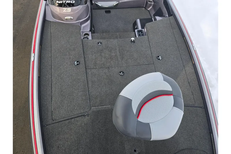 Slide: The Image of 2013 Nitro Z-9 boat interior with gray carpet and seating. - 17
