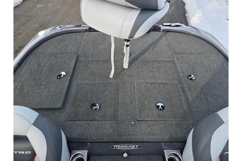 Slide: The Image of 2013 Nitro Z-9 boat deck with gray carpet and seating. - 21