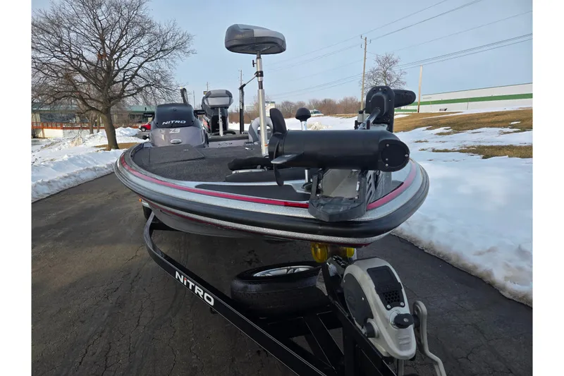 Slide: The Image of 2013 Nitro Z-9 boat on trailer, parked on snowy pavement. - 6