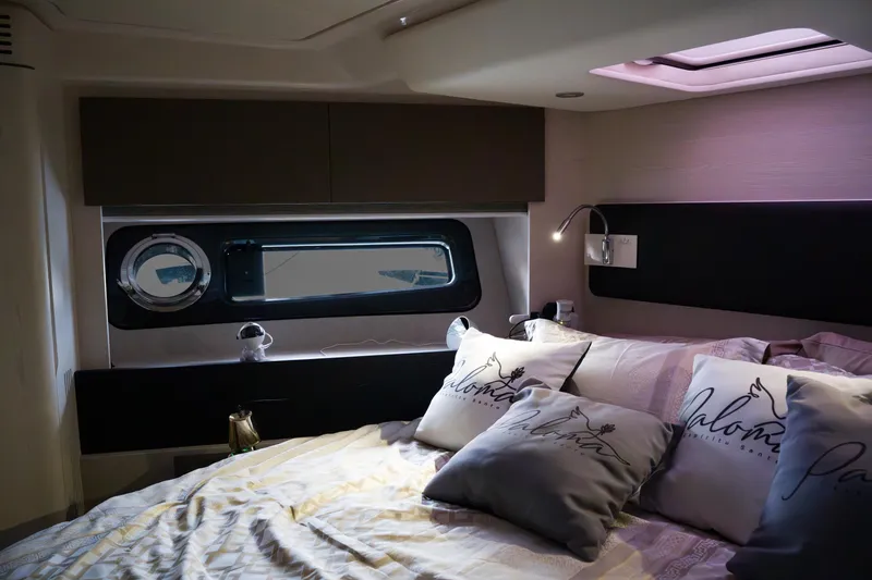 Slide: The Image of Luxurious bedroom interior of 2019 Azimut Fly 50 yacht with elegant bedding and modern lighting. - 18