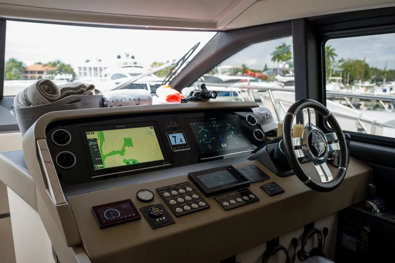 Slide: The Image of Cockpit of 2019 Azimut Fly 50 yacht with modern navigation controls and steering wheel. - 24