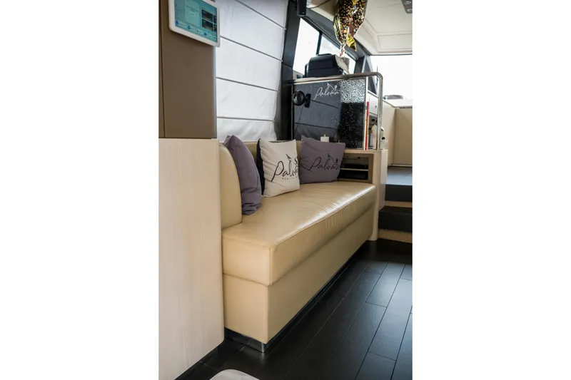 Slide: The Image of Luxurious interior of 2019 Azimut Fly 50 yacht with beige seating and decorative pillows. - 27