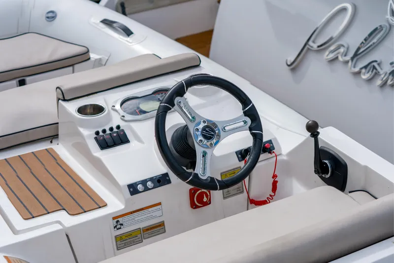 Slide: The Image of Steering console of 2019 Azimut Fly 50 yacht with controls and seating. - 45