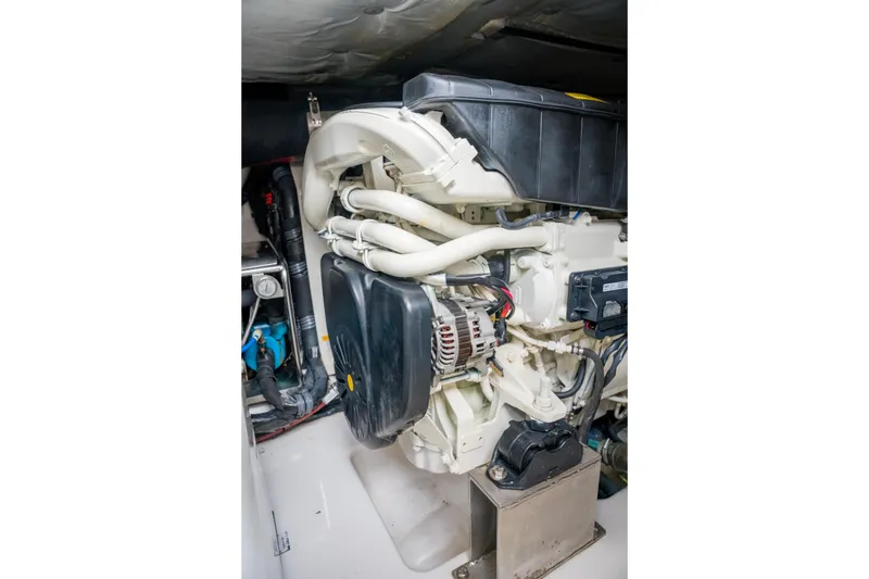 Slide: The Image of Engine compartment of a 2019 Azimut Fly 50 yacht, showcasing mechanical components. - 48