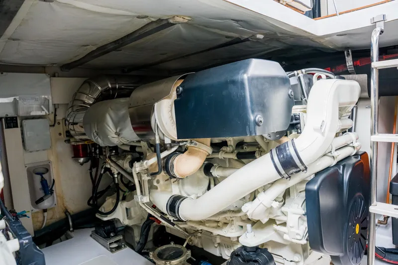 Slide: The Image of Engine room of a 2019 Azimut Fly 50 yacht, showcasing detailed machinery components. - 49
