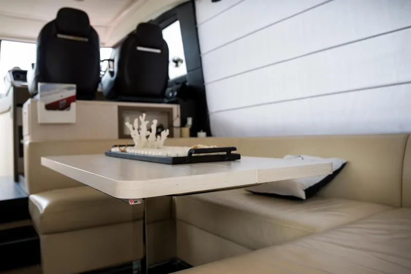 Slide: The Image of Luxurious interior of 2019 Azimut Fly 50 yacht with elegant seating and table. - 7