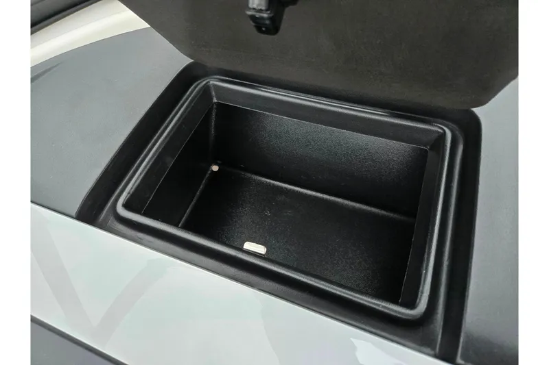 Slide: The Image of Open storage compartment in 2017 Regal 1900 ESX Bowrider boat. - 16