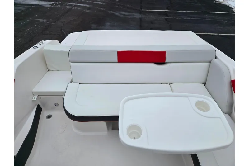Slide: The Image of 2017 Regal 1900 ESX Bowrider interior seating with white and red upholstery. - 21