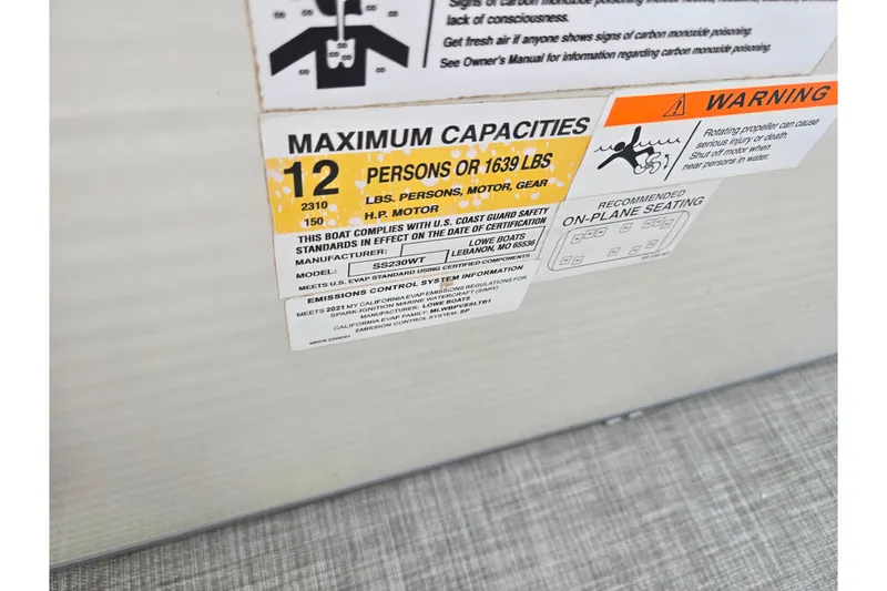 Slide: The Image of Capacity label on 2021 Lowe SS 230 WT boat, maximum 12 persons or 1639 lbs. - 15
