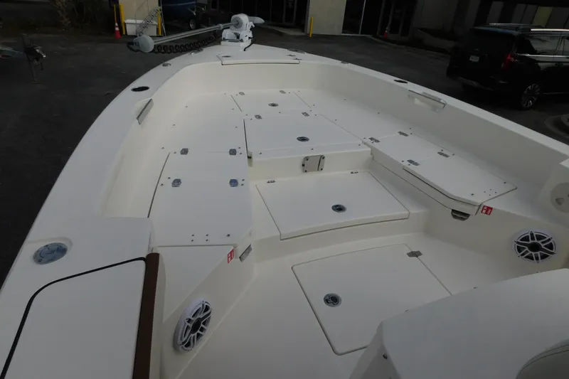 Slide: The Image of 2026 Pathfinder 2600 TRS boat interior with storage compartments and speakers. - 11