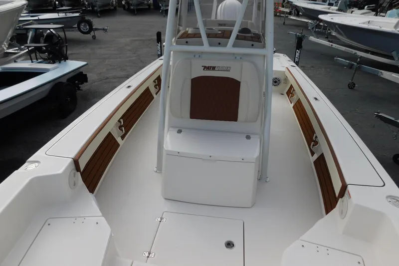 Slide: The Image of 2026 Pathfinder 2600 TRS boat interior with seating and storage compartments. - 12
