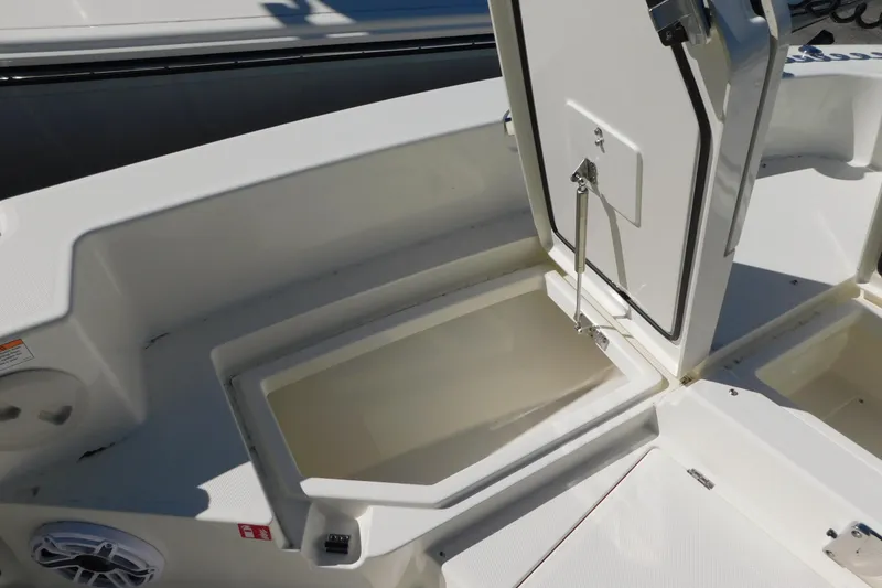 Slide: The Image of Open storage compartment on 2026 Pathfinder 2600 TRS boat, showcasing interior space. - 33