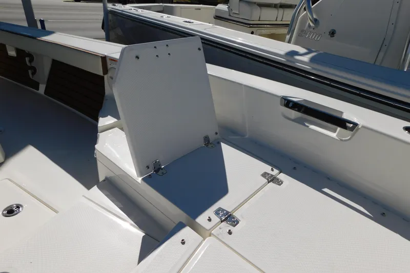 Slide: The Image of 2026 Pathfinder 2600 TRS boat interior with seating and storage compartments. - 37