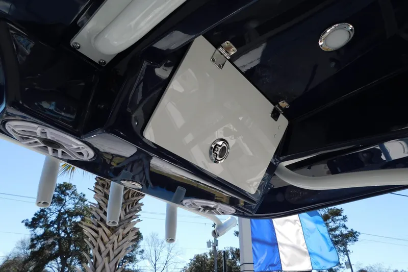 Slide: The Image of 2026 Pathfinder 2600 TRS boat underside with speakers and storage compartment. - 51