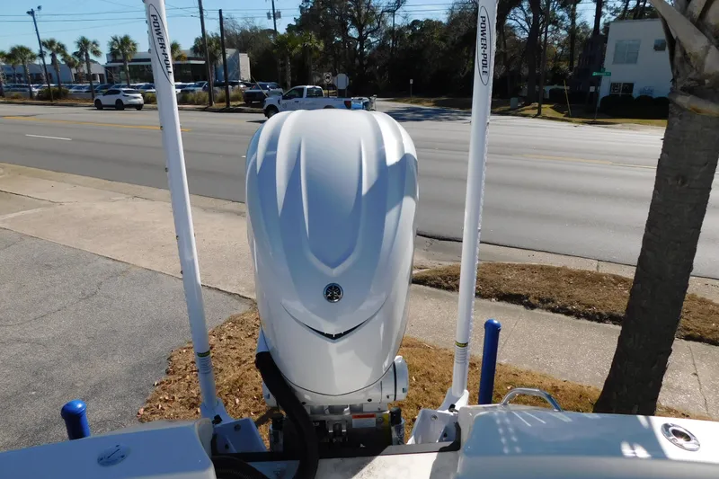 Slide: The Image of 2026 Pathfinder 2600 TRS boat with Yamaha outboard engine and Power-Pole anchors. - 52