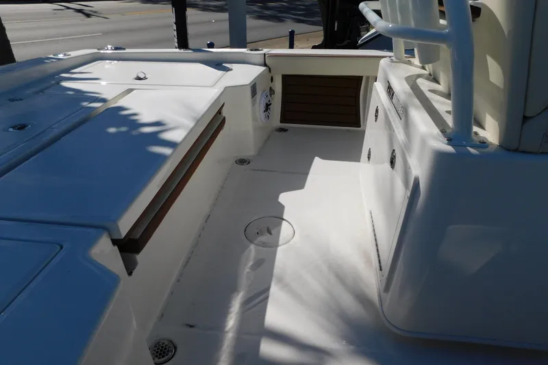 Slide: The Image of 2026 Pathfinder 2600 TRS boat interior with seating and storage compartments. - 57