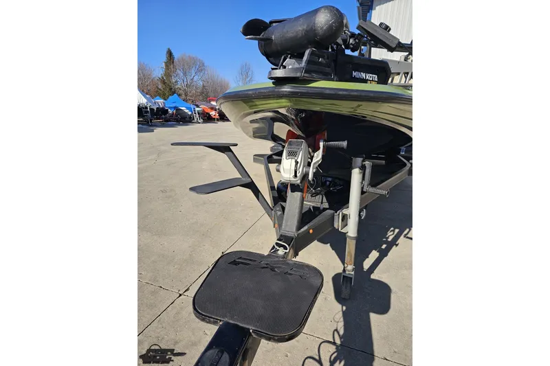 Slide: The Image of 2022 Skeeter FXR21 Apex boat with Minn Kota motor on trailer. - 20