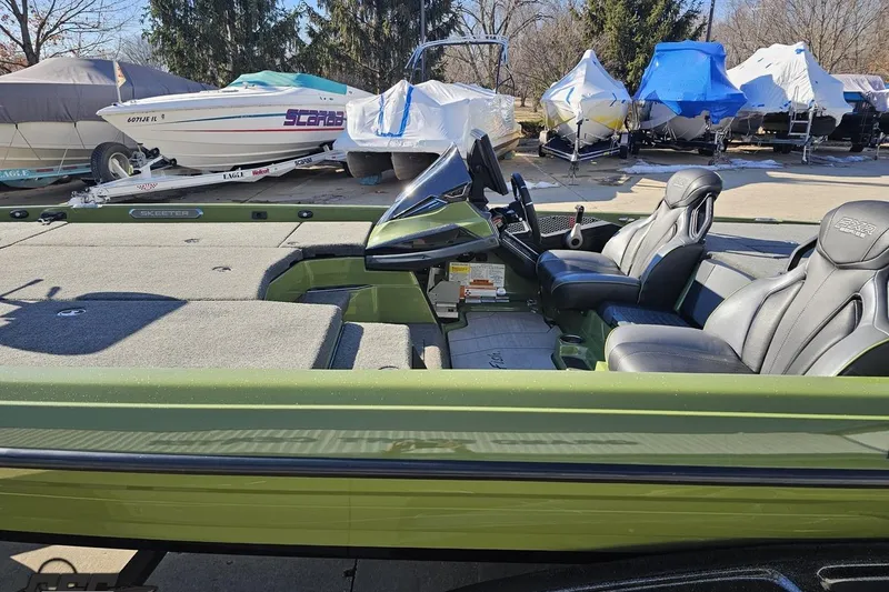 Slide: The Image of 2022 Skeeter FXR21 Apex boat with sleek design and comfortable seating. - 30