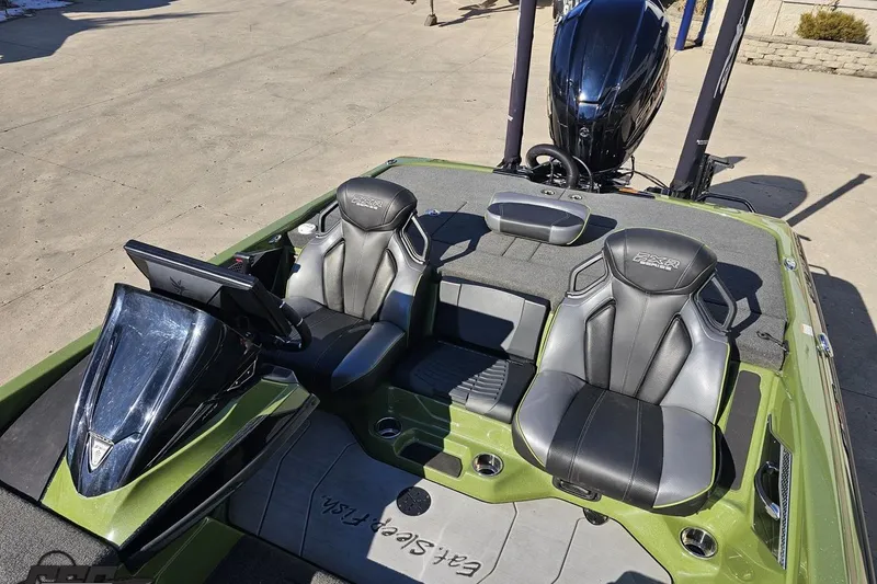 Slide: The Image of 2022 Skeeter FXR21 Apex boat interior with dual seats and control panel. - 84