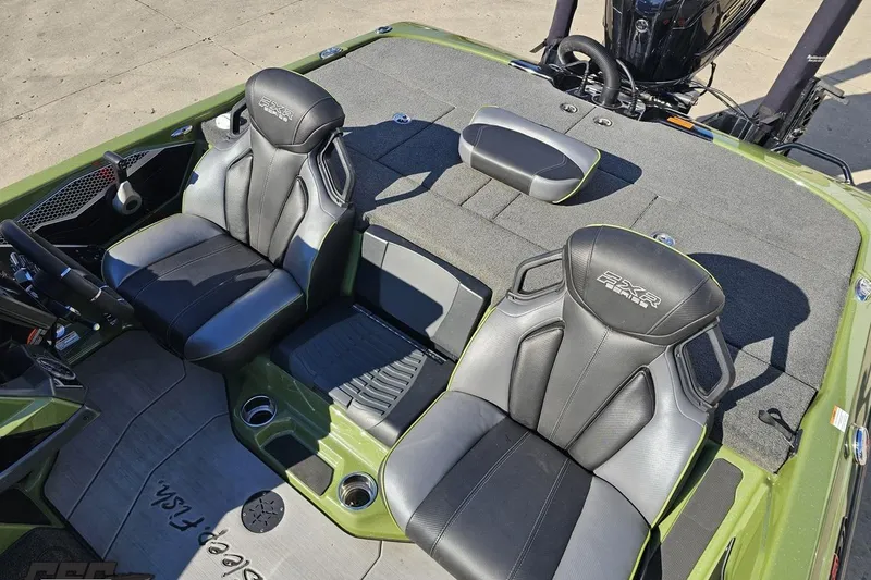 Slide: The Image of 2022 Skeeter FXR21 Apex boat interior with black and gray seating. - 85