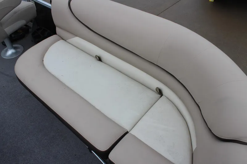 Slide: The Image of 2016 Sun Tracker Party Barge 24 XP3 beige seating area, clean and spacious. - 10