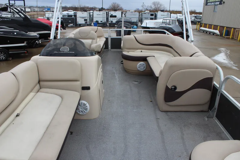Slide: The Image of 2016 Sun Tracker Party Barge 24 XP3 with beige seating and spacious deck layout. - 20