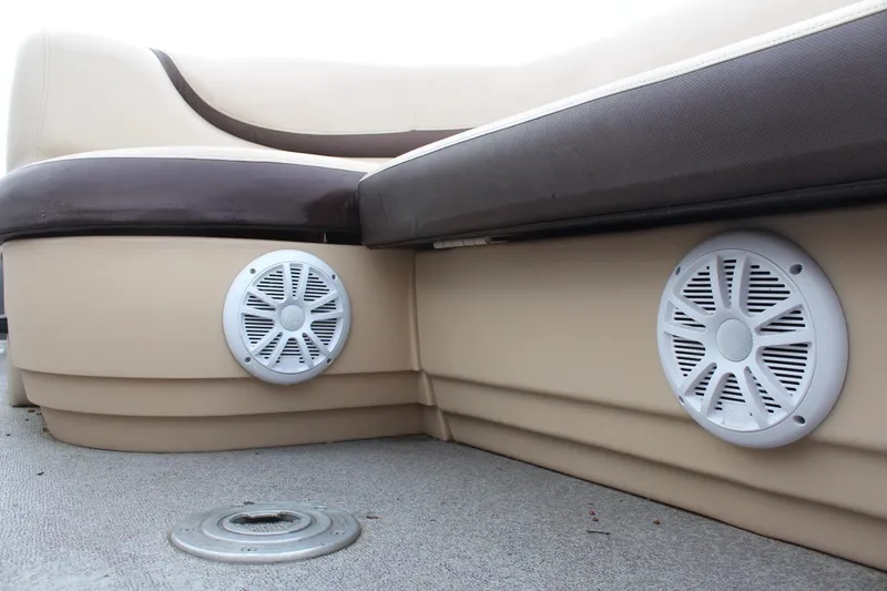 Slide: The Image of 2016 Sun Tracker Party Barge 24 XP3 interior with speakers and seating. - 22