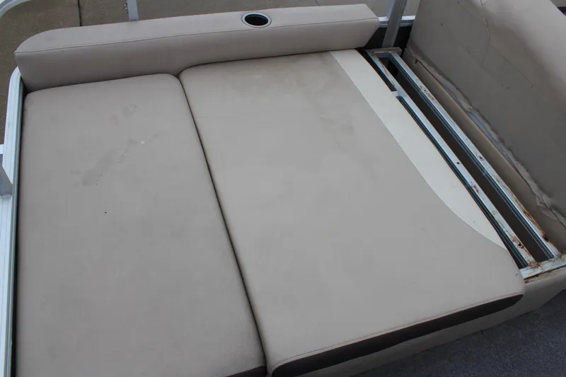 Slide: The Image of 2016 Sun Tracker Party Barge 24 XP3 seating with cup holder and storage compartment. - 9