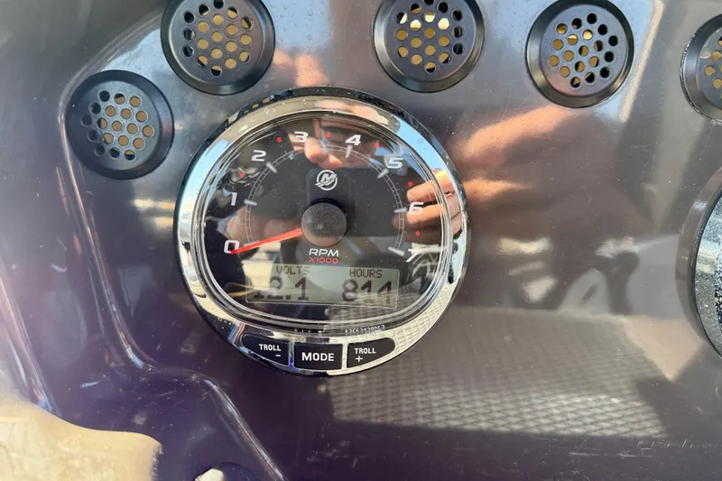 Slide: The Image of Close-up of 2020 Bayliner VR5 Bowrider OB dashboard gauge showing RPM and voltage. - 16