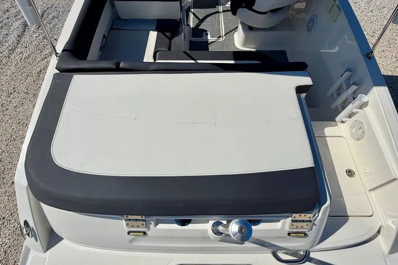 Slide: The Image of 2020 Bayliner VR5 Bowrider OB boat interior with seating and storage compartments. - 22