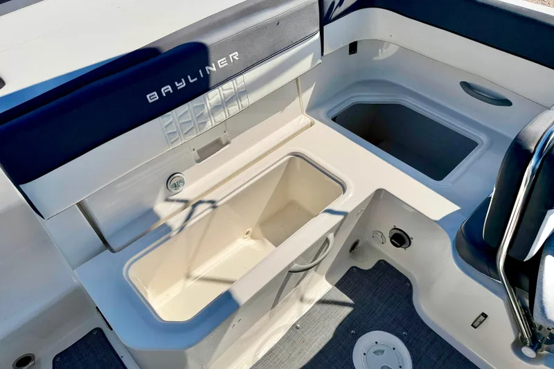 Slide: The Image of 2020 Bayliner VR5 Bowrider OB interior with storage compartments and seating. - 24