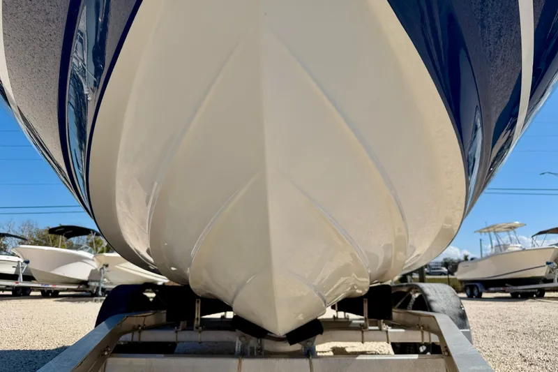 Slide: The Image of 2020 Bayliner VR5 Bowrider OB boat on trailer, close-up view of hull design. - 32