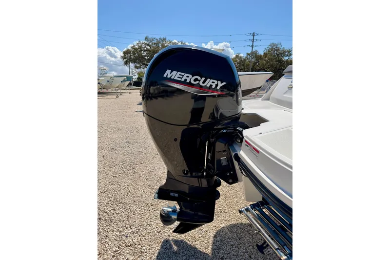 Slide: The Image of 2020 Bayliner VR5 Bowrider OB with Mercury outboard motor in a sunny outdoor setting. - 35
