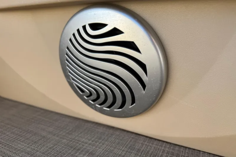 Slide: The Image of Speaker grille on 2019 Sun Tracker SportFish 22 DLX boat interior. - 17