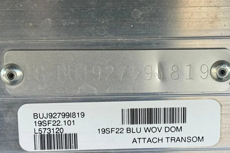 Slide: The Image of 2019 Sun Tracker SportFish 22 DLX serial number plate with barcode and model details. - 33