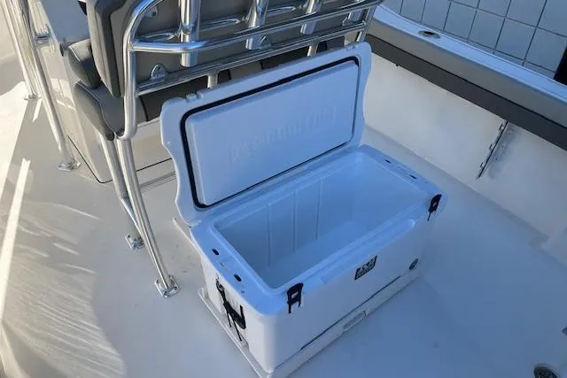Slide: The Image of Open cooler on 2026 Key West 239 FS boat deck, showcasing storage space. - 10