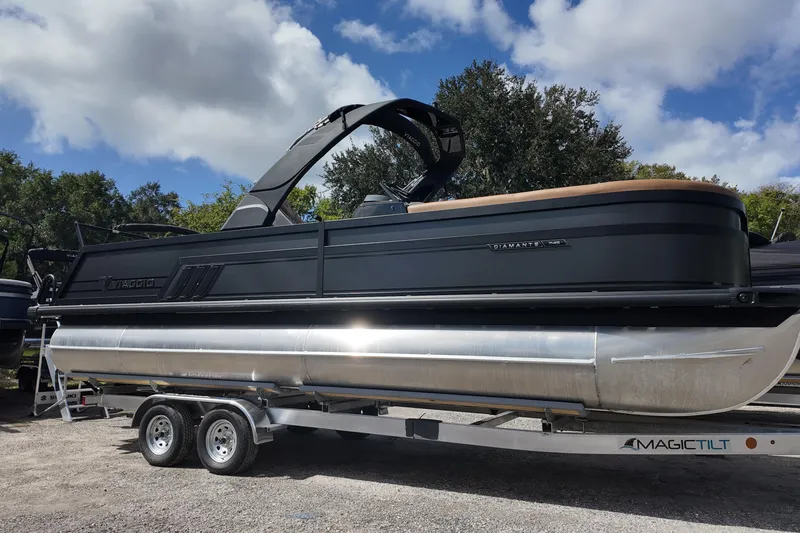 The Image of 2026 Viaggio Diamante 24S pontoon boat on trailer under blue sky. - 0