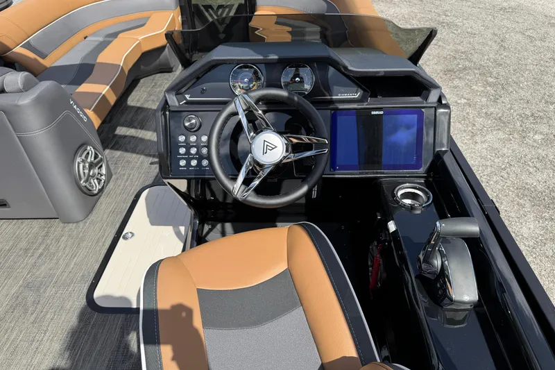 Slide: The Image of 2026 Viaggio Diamante 24S boat dashboard with modern controls and luxurious seating. - 14