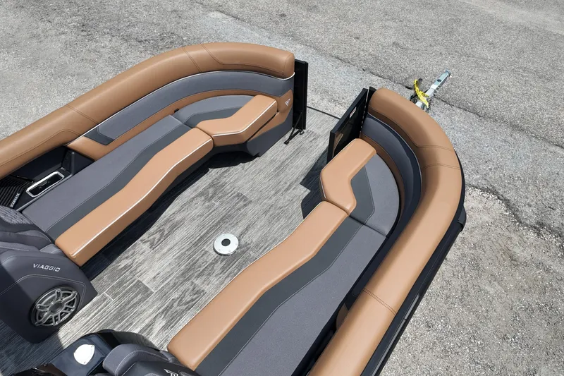 Slide: The Image of Luxurious seating on 2026 Viaggio Diamante 24 S boat, featuring sleek brown and gray upholstery. - 8