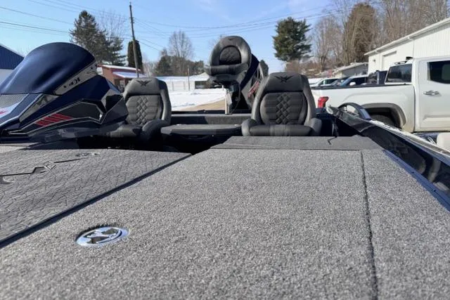 Slide: The Image of 2026 Vexus VXs20 boat interior with cushioned seats and sleek design. - 10