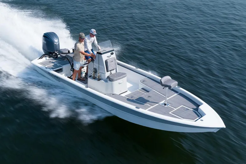 The Image of Manufacturer Provided Image: Avid 21 Mag boat 2026 on water with two people. - 1