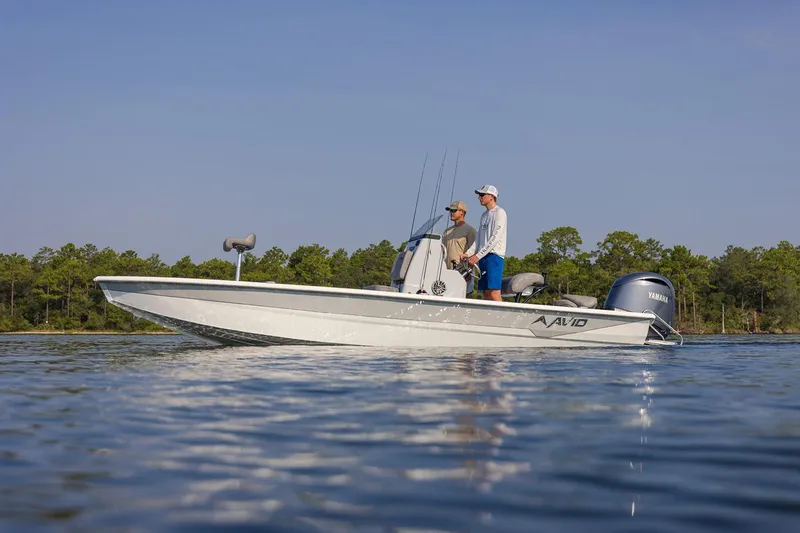 Slide: The Image of Manufacturer Provided Image: Avid 21 Mag boat 2026 on calm water with two people. - 3