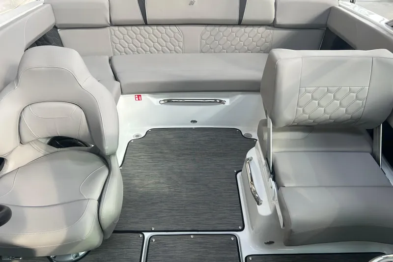 Slide: The Image of 2026 Four Winns H2 boat interior with luxurious gray seating and modern design. - 26
