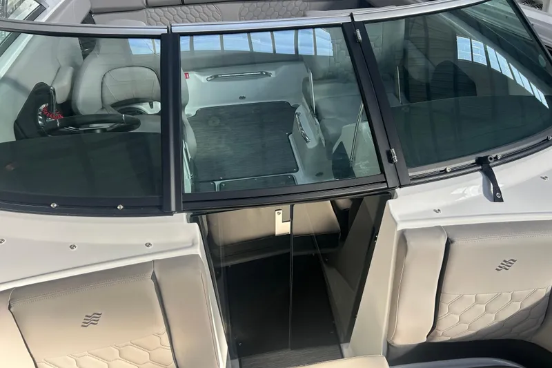 Slide: The Image of 2026 Four Winns H2 boat interior with sleek seating and modern design. - 30